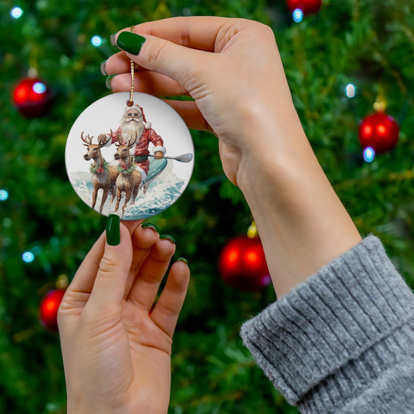 Santa on SUP Board with Reindeer Christmas Ceramic Ornament