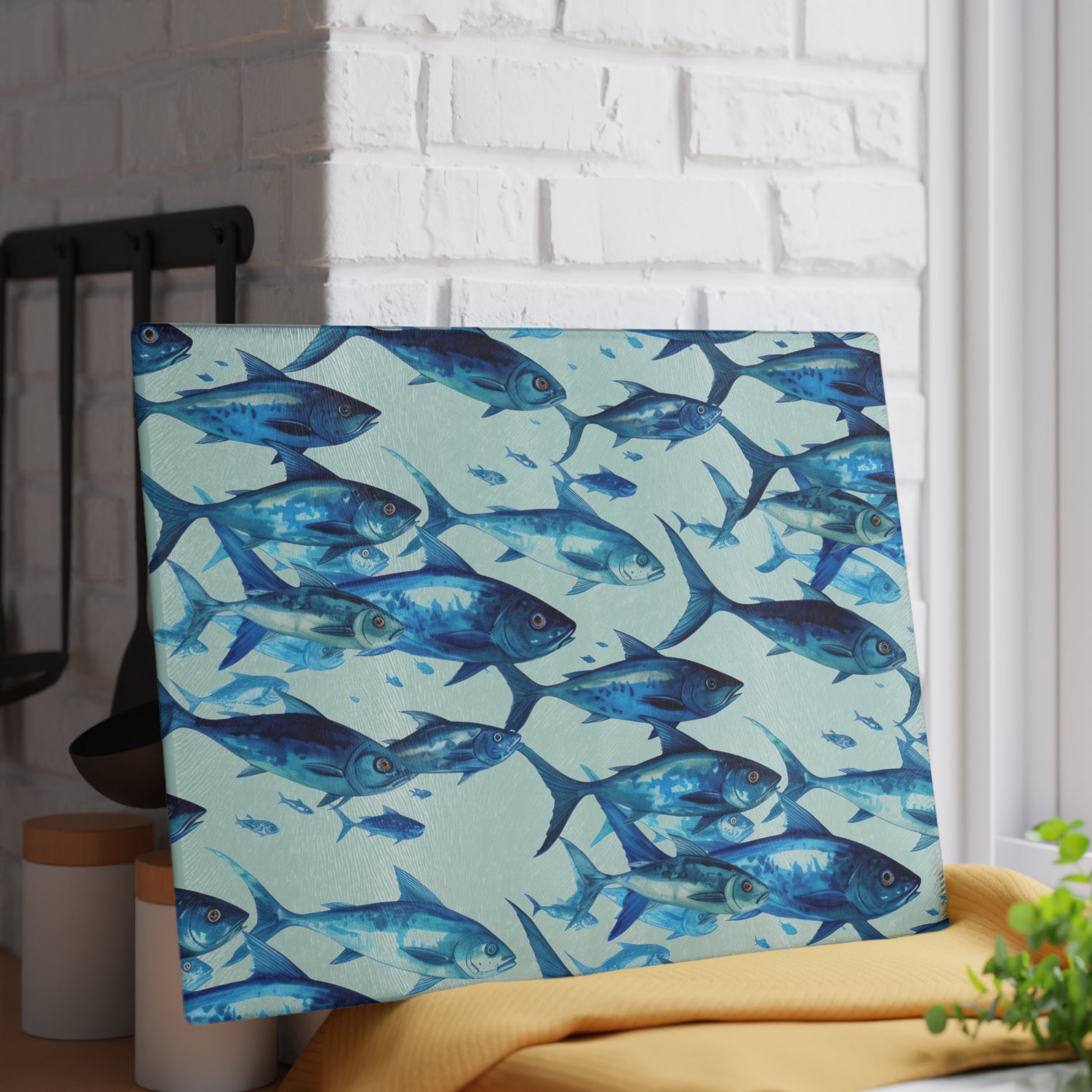 glass cutting board with colorful fish