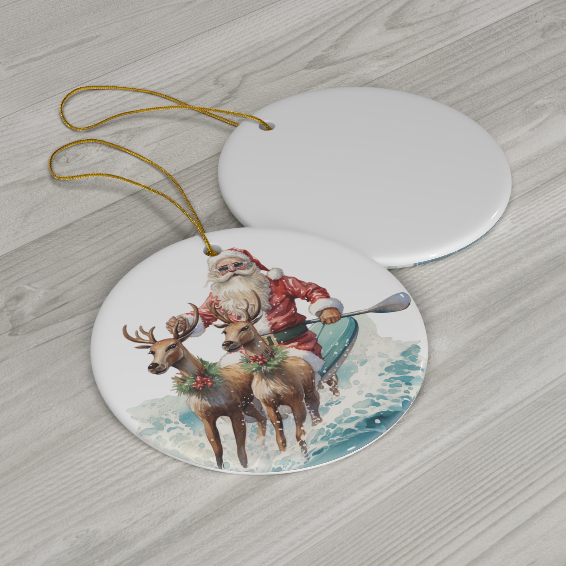 Santa on SUP Board with Reindeer Christmas Ceramic Ornament