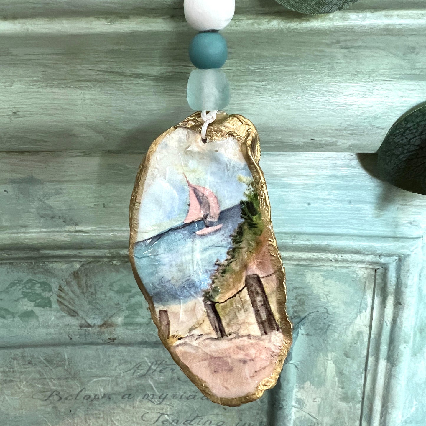 Gilded Sailboat on the Ocean Oyster Shell Ornament